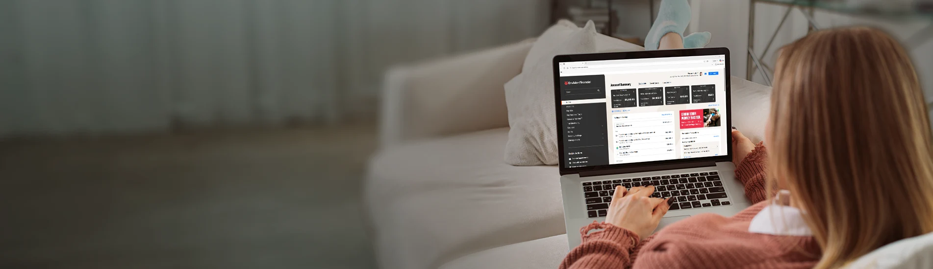 girl on laptop on couch